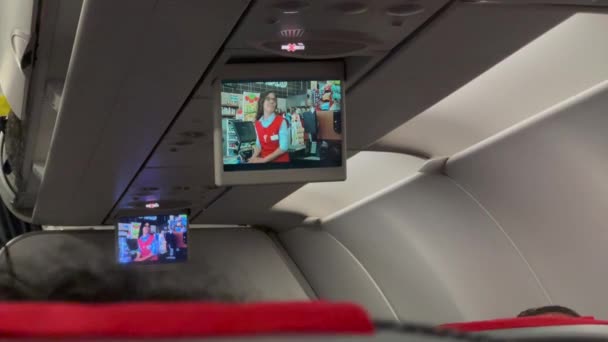 Two Multimedia Monitors Middle Commercial Airplane Playing Show Flight — Vídeo de Stock