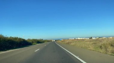 Dashcam view of a car driving on the highway in Morocco
