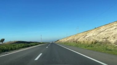 Dashcam view of a car driving on the highway in Morocco