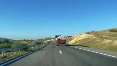 Dashcam view of a car driving on the highway in Morocco