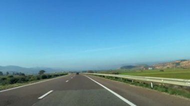 Dashcam view of a car driving on the highway in Morocco