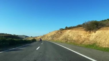 Dashcam view of a car driving on the highway in Morocco