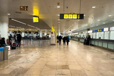 Travelers walking inside Charleroi international airport in Belgium