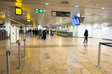 Travelers walking inside Charleroi international airport in Belgium