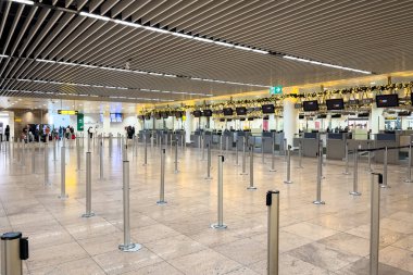 Rmpty check-in desks at the airport terminal at Brussels Zavantem international airport, Belgium