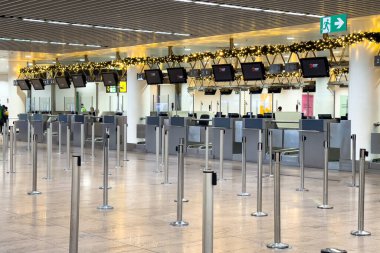 Rmpty check-in desks at the airport terminal at Brussels Zavantem international airport, Belgium