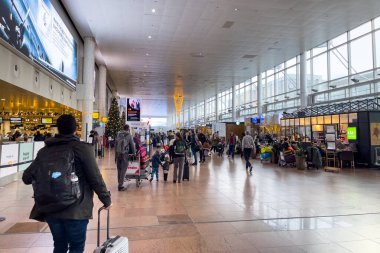 Travelers walking inside Charleroi international airport in Belgium