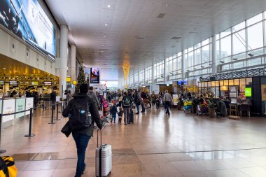 Travelers walking inside Charleroi international airport in Belgium