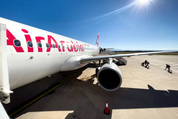 stock image  Passengers boarding an Air Arabia commercial airplane at Fes Sais international airport in Morocco