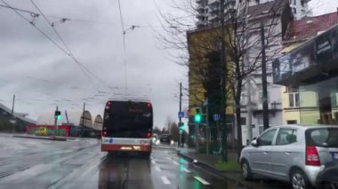 Dashcam of a car driving on the road during a rainy day in Brussels, Belgium