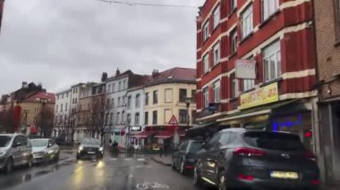 Dashcam of a car driving on the road during a rainy day in Brussels, Belgium