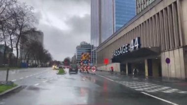 Dashcam of a car driving on the road during a rainy day in Brussels, Belgium