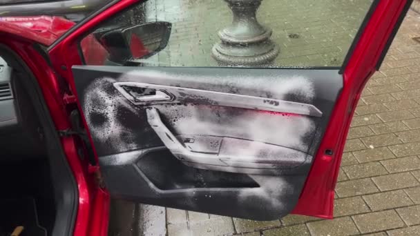 Open Car Door Covered White Cleaning Soap Light Rain Falling — Vídeos de Stock