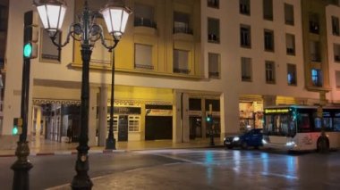 bus driving on the road at night in Rabat, Morocco