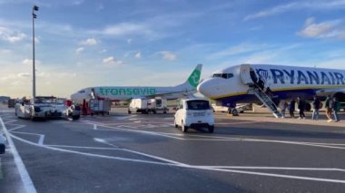 Passengers boarding a Ryanair commercial airplane at Zaventem international airport in Belgium