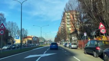 Car driving through the roads of Turin, Italy