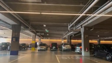 Dashcam of a car driving inside a private parking lot in Turin, Italy