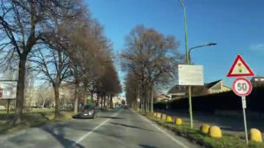 Car driving through the roads of Turin, Italy