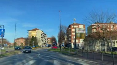 Car driving through the roads of Turin, Italy