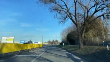 Car driving through the roads of Turin, Italy