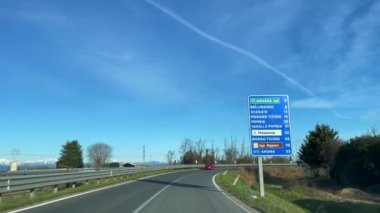 Car driving through the roads of Turin, Italy