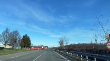 Car driving through the roads of Turin, Italy