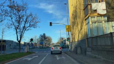 Car driving through the roads of Turin, Italy