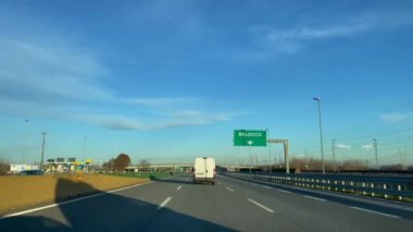 Car driving through the roads of Turin, Italy