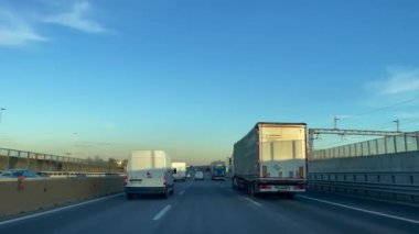 Car driving through the roads of Turin, Italy