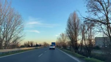 Car driving through the roads of Turin, Italy