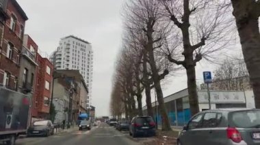 Dashcam of a car driving on the road during a rainy day in Brussels, Belgium