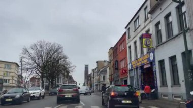 Dashcam of a car driving on the road during a rainy day in Brussels, Belgium