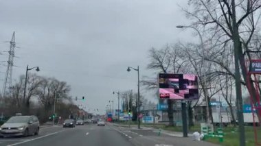 Dashcam of a car driving on the road during a rainy day in Brussels, Belgium