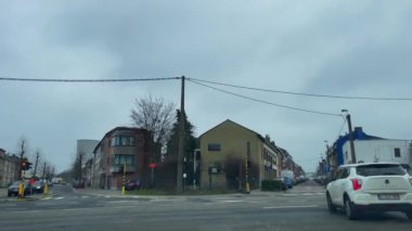 Dashcam of a car driving on the road during a rainy day in Brussels, Belgium