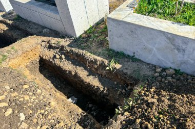Empty grave plot at a Muslim cemetery