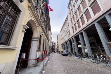 Empty street downtown Novara in Italy clipart