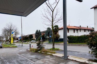 Empty road during winter in Legnano, Italy