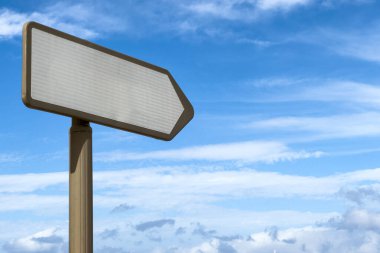 Blank right directional signpost with blue sky in the background