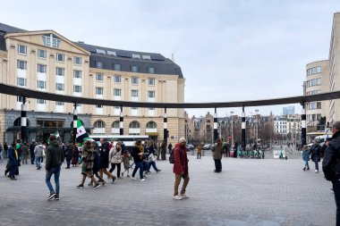 Palestinians protesting in a public square in Brussels, Belgium