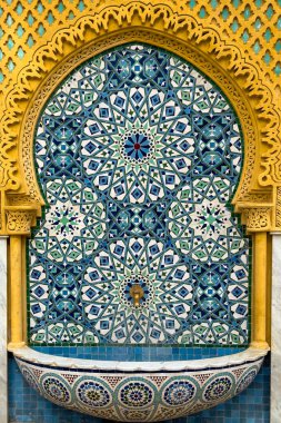 Traditional Moroccan wall fountain in a Jnan Sbil Gardens in Fez