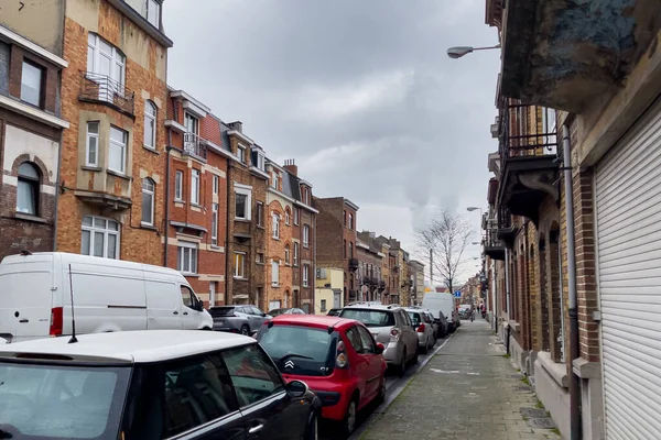 stock image Cars parked on the roadside of an empty street in Brussels, Belgium