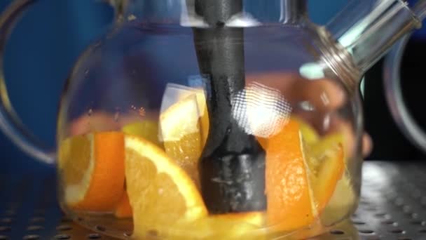 Bartender Squeezes Fruit Tea — Stock Video
