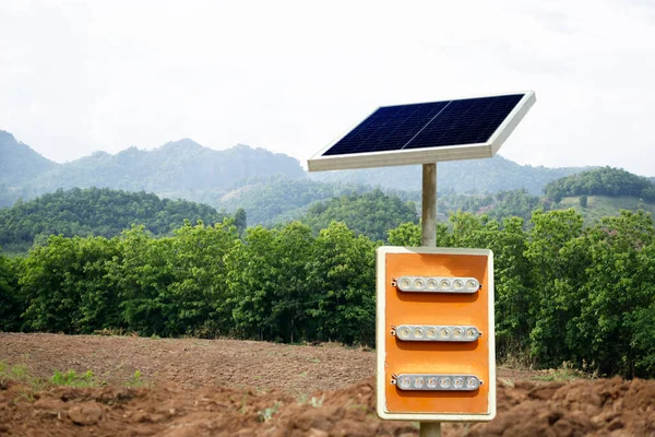 Mini solar panel, installed at agriculture land. Concept : using green and clean energy for environment.  Renewable energy, Natural power from sunlight to reduce global warming.