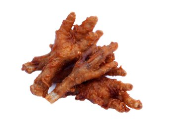 Fried crispy chicken feet isolated on white background. Concept, weird, exotic food. delicious and popular street food in Thailand