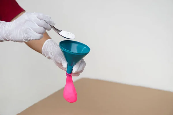 Closeup Hands Wears Gloves Holds Funnel Flat Pink Balloon Put — Stock Photo, Image
