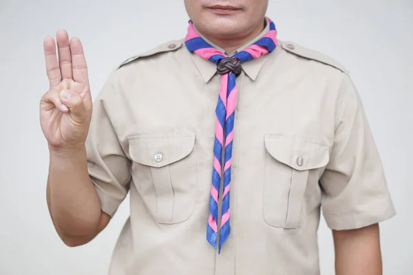 Hand sign code of scout. Concept, Scout activity that teaching in schools Thailand. Hand signs and symbols which meaningful in scouting lesson. Show hand sign for oath.