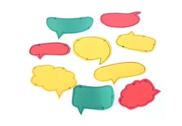 Colorful speech bubble paper  cards , white background. Concept, speaking. Communication. Teaching aid. Education materials. Blank for add text or words  in the bubbles.