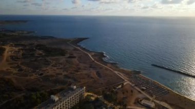 Aerial view of Paphos cityscape, Cyprus. Architecture and urban city with buildings and streets. Mediterranean sea. High quality footage 4k