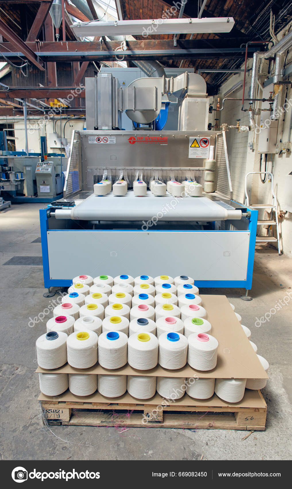 Kent 2023 White Spindles Industrial Cotton Being Fed Machine Weaving