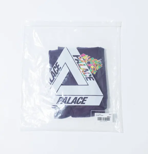 stock image kent, uk 01.01.2023 Palace skateboarding Genuine official Palace b Sans t shirt in navy blue. street fashion and street skateboarding style clothing brand like supreme.